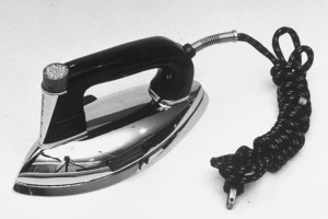 I think this GE iron is from the '50s. I remember ours, regardless of brand, being a lot bigger and heavier. But maybe that's because I was smaller. [Internet photo]